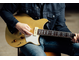 Close-up of Chris Buck’s hands playing the RS02CB.