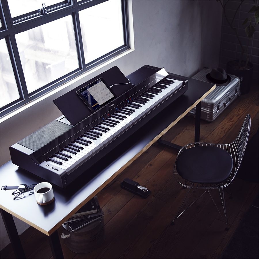 A Yamaha P-S500 digital piano on a desk