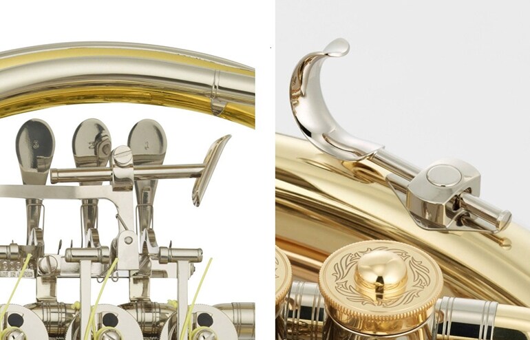 ก้านกดนิ้วโป้งตัวที่ 4 และที่พักนิ้วก้อยแบบปรับระดับได้